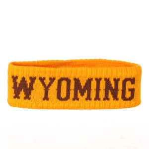 gold winter headband with word Wyoming in brown stitched in the fabric