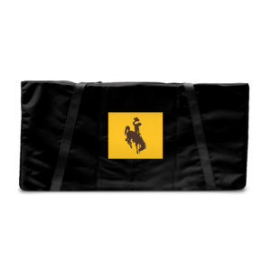 black fabric corn hole set carrying case. gold square in the middle with brown bucking horse printed in the center. two fabric straps