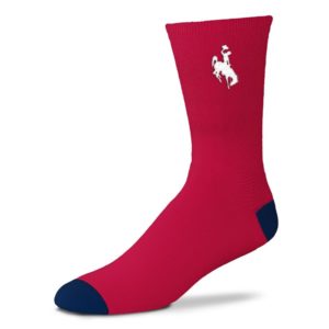 red crew length sock. white bucking horse printed on top of sock. navy colored heel and toe box of sock