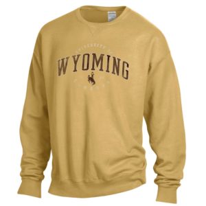 comfort wash, faded gold crew neck sweatshirt. Word Wyoming and bucking horse distressed printed in brown and white