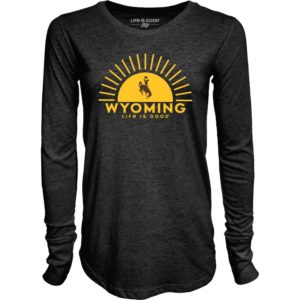 women's black long sleeved tee. heathered soft fabric. Gold sunshine design with word Wyoming printed in brown