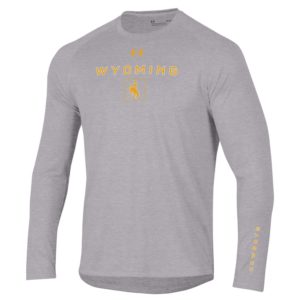 athletic material, grey long sleeved tee. print on the front is UA logo, word Wyoming, and bucking horse all printed in gold.