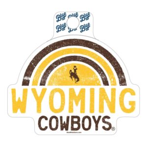 arched, rainbow shaped decal in brown and gold. Slogan Wyoming Cowboys printed below in brown and gold