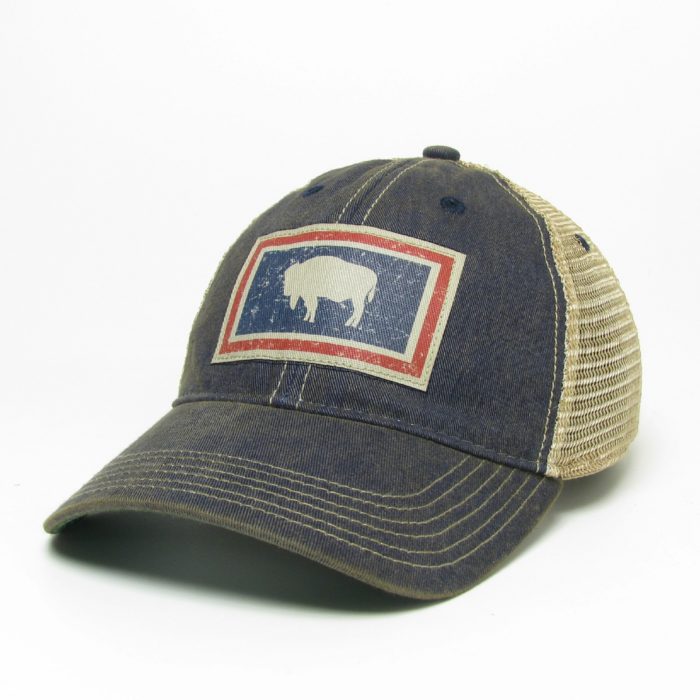 washed navy adjustable, unstructured hat with tan mesh back that has a Wyoming state flag distressed fabric patch on the front