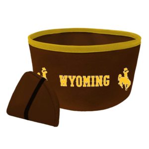 8 inch in diameter collapsable pet bowl. durable brown fabric, gold trim and word Wyoming printed along bowl