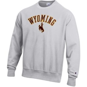 reverse weave material, silver grey crewneck sweatshirt. Design on front is word Wyoming arched above bucking horse, all in brown with gold outline