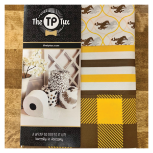 package of 9 tissue paper wraps, designed to wrap a roll of toilet paper. paper is brown, gold and white Wyoming patterns
