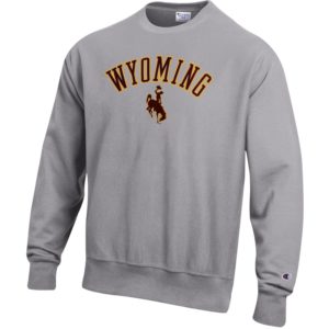 reverse weave material, grey crewneck sweatshirt. Design on front is word Wyoming arched above bucking horse, all in brown with gold outline