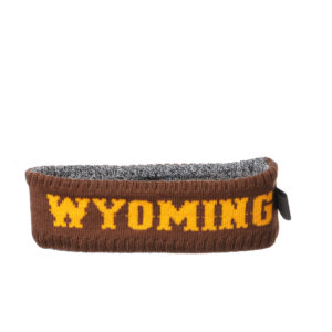 reversible, knit winter headband. one side is brown with word Wyoming in gold across headband