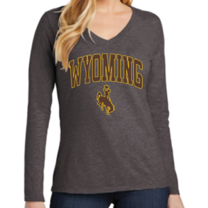 charcoal grey women's v-neck tee. Word Wyoming arced and bucking horse printed on front in brown, outlined in gold