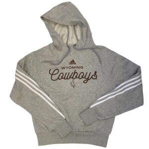Adidas, women's grey hooded sweatshirt. shorter body style. front pocket. Adidas logo and slogan Wyoming Cowboys printed on front in brown script font