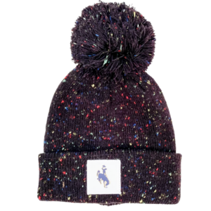 youth, black speckled knit beanie. multicolor pom on top and black specked cuff. square bucking horse patch sewn on front cuff