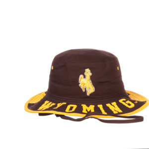front view of brown bucket hat with gold trim and eyelets. front part of brim is brown with word Wyoming in gold. gold embroidered bucking horse on front center
