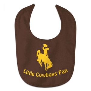 brown infant bib with words little cowboys fan and a bucking horsed printed on front in gold. velcro closure