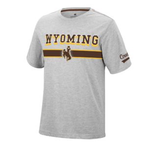 men's grey, short sleeved tee. Word Wyoming with large stripe below printed on front in brown with gold outline. Word Cowboys printed across left sleeve in brown