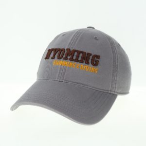 dark grey garment washed, adjustable hat. Word Wyoming embroidered in brown on front, with slogan swimming and diving embroidered in gold below