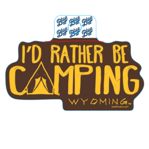 brown decal with gold lettering that includes camping slogan and word Wyoming