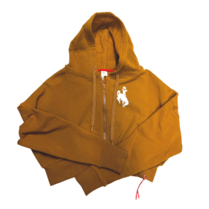 camel colored, women's cropped zippered sweatshirt. hood, and two front pockets. white bucking horse printed on left chest