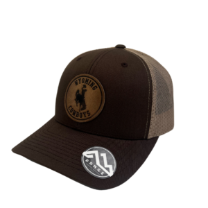 structured, mid profile hat with snapback closure. brown front, khaki mesh back. Leather Wyoming Cowboys patch with bucking horse on front of hat