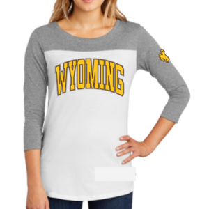 women's 3/4 sleeve tee. White body, with grey neckline and sleeves. Word Wyoming printed in gold on front and small gold bucking horse on left sleeve