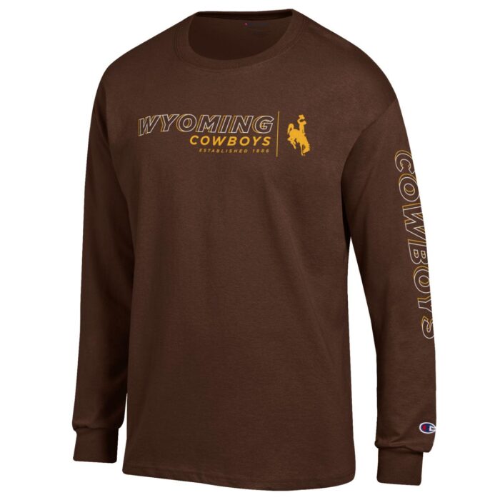 brown, long sleeved tee. Slogan Wyoming Cowboys with bucking horse to the left of slogan printed on front in gold and white. Word Cowboys printed down left sleeve