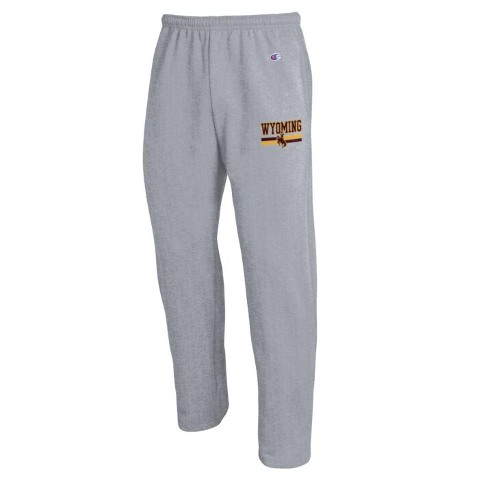 mens grey, open bottom sweat pants. Champion logo and word Wyoming with bucking horse printed in brown and gold on top left of pant