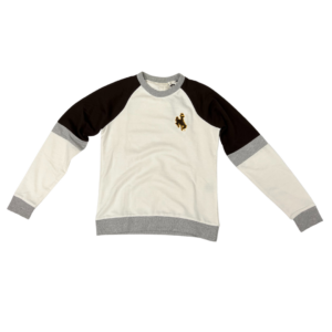 women's crewneck sweatshirt. Ivory body, brown sleeves, and grey detailing. Small brown bucking horse with gold outline embroidered on left chest