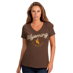 women's brown v-neck short sleeved tee. Word Wyoming printed in white script font on front of tee, below is bucking horse and word Cowboys printed smaller