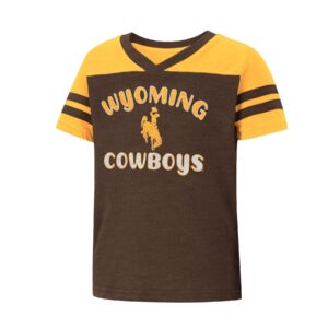brown toddler, short sleeved tee. gold colored shoulders and sleeves. Design on front is slogan Wyoming Cowboys with bucking horse in between in gold and white glitter