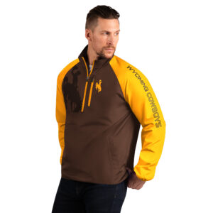1/2 zip, athletic material jacket. brown body with gold sleeves and trim. Gold bucking horse on left chest, slogan, Wyoming Cowboys printed down left sleeve in brown