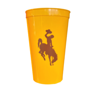 gold, plastic 16 oz cup. Brown bucking horse logo printed on front center of cup in brown