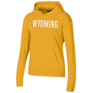 under armour women's gold hooded sweatshirt, design is white word Wyoming in center chest, kangaroo pocket in front