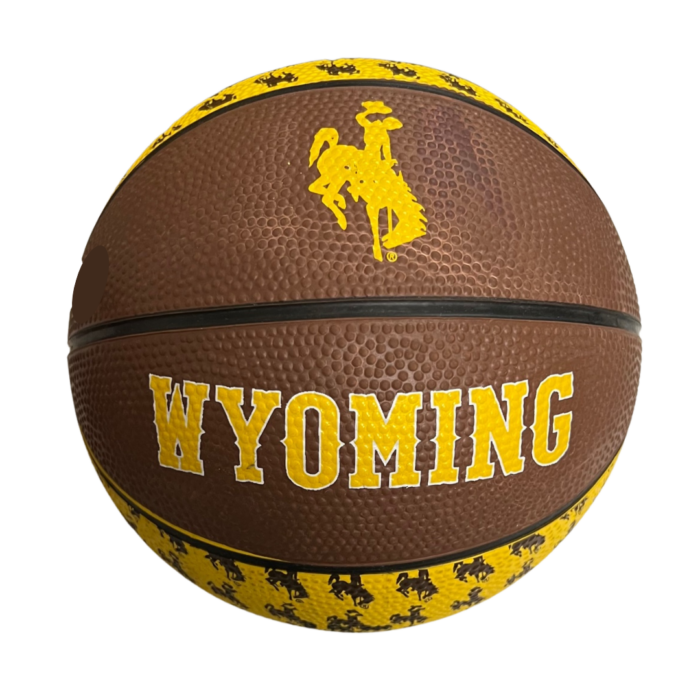small rubber basketball with some panels brown and some gold with repeated bucking horses. On front is word Wyoming with bucking horse above