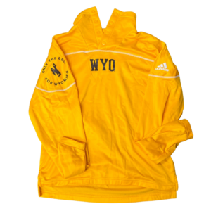 gold 1/4 snap jacket. slogan WYO printed on front center in brown. White Adidas logo printed on left arm, and bucking horse with slogan printed on right arm