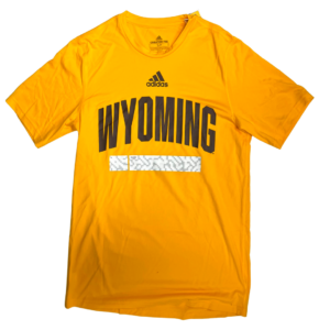 gold athletic short sleeved tee. Adidas logo and word Wyoming printed in brown, with a white bar printed below. design on front center of tee
