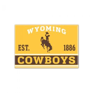 metal gold rectangle magnet, design is white word Wyoming arched about brown bucking horse, word est. 1886 on either side, white lines with brown line with gold word Cowboys