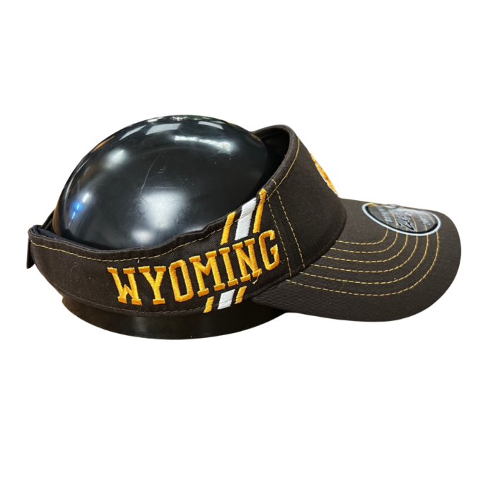 side of brown adjustable visor with gold stitching, gold word Wyoming with gold and white stripes behind