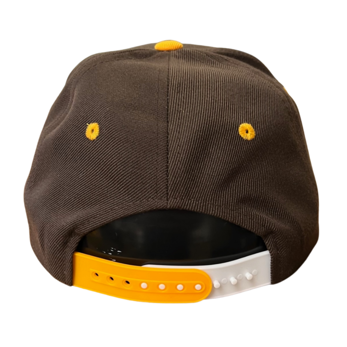 back of youth flat brown flat bill hat, gold and white plastic adjustable strap
