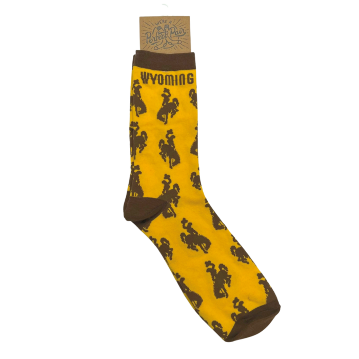 men's gold socks with brown toe, heel and cuff, design is brown bucking horses repeated, brown word Wyoming at top