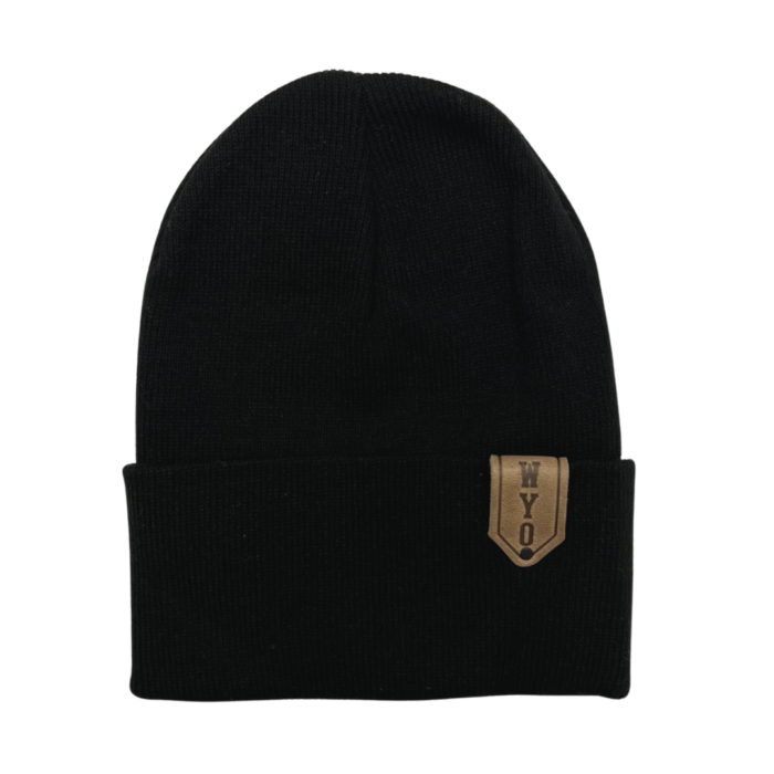 black knit beanie with leather patch on side of cuff. Design is word WYO stamped into the leather patch