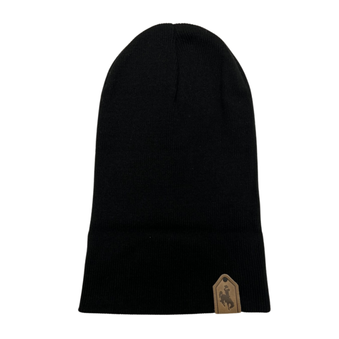 black knit beanie rolled down cuff with leather patch on side. Design is bucking horse stamped into the leather patch