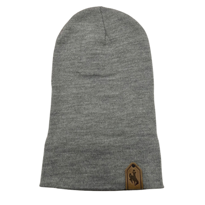 heather grey knit beanie rolled down cuff with leather patch on side. Design is bucking horse stamped into the leather patch
