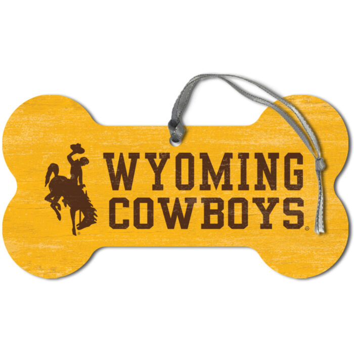 gold dog bone shaped wooden ornament, design is brown bucking horse on left, brown words Wyoming cowboys stacked on right