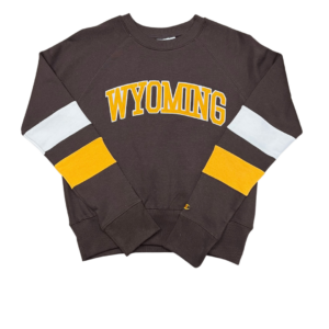 women's brown crew crewneck sweatshirt, gold and white stripes on sleeves, design is gold word Wyoming arched on chest
