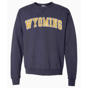 women's grey crew neck sweatshirt, distressed color and design, design is gold word Wyoming outlined in white