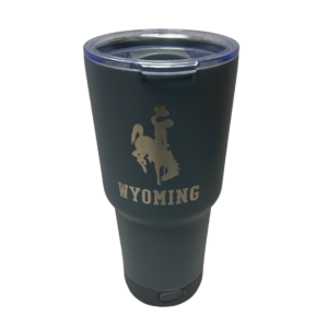 grey 28 ounce tumbler, clear plastic lid, silver bucking horse above word Wyoming on front, detachable speaker on bottom