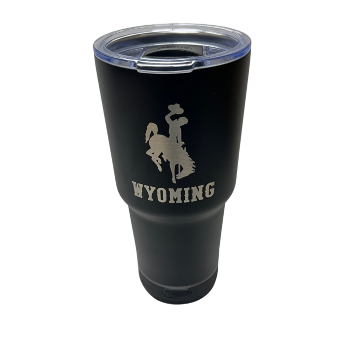 black 28 ounce tumbler, clear plastic lid, silver bucking horse above word Wyoming on front, detachable speaker on bottom