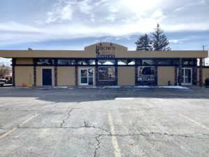 photo of the brown and gold store front