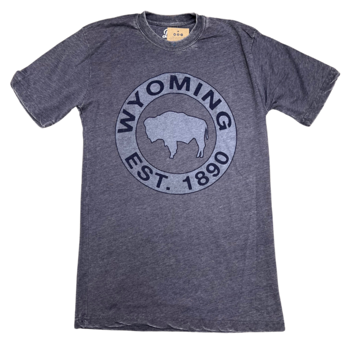 men's faded blue short sleeve tee, design is slogan Wyoming set 1886 in the shape of a circle, around a white buffalo