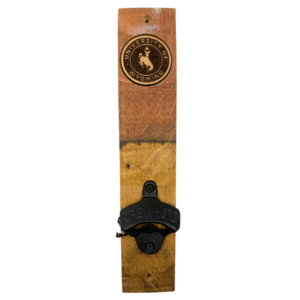 Barrel wood mount bottle opener, design is university of Wyoming surrounding bucking horse image above metal bottle opener